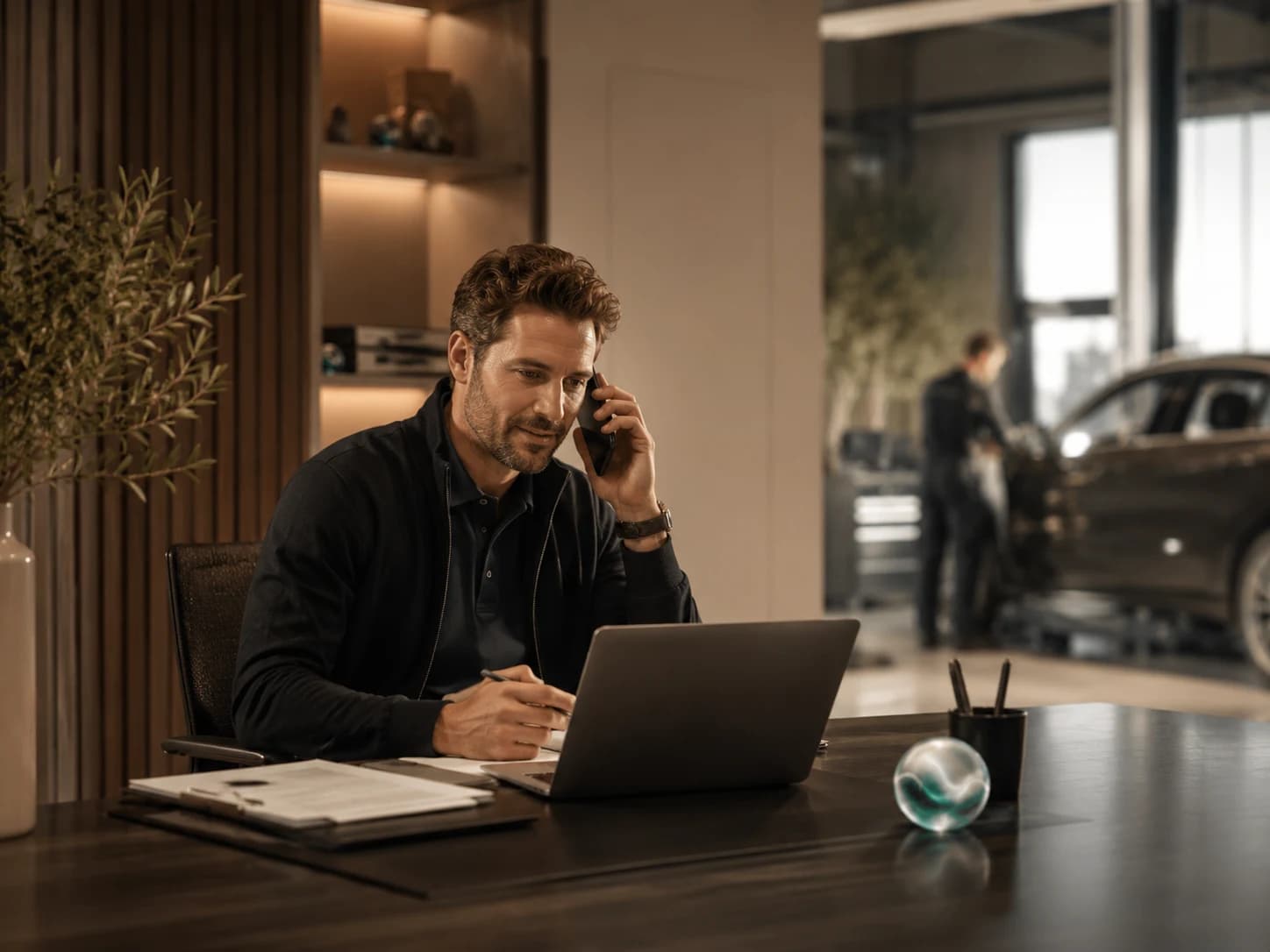 Auto service desk handling customer appointment calls
